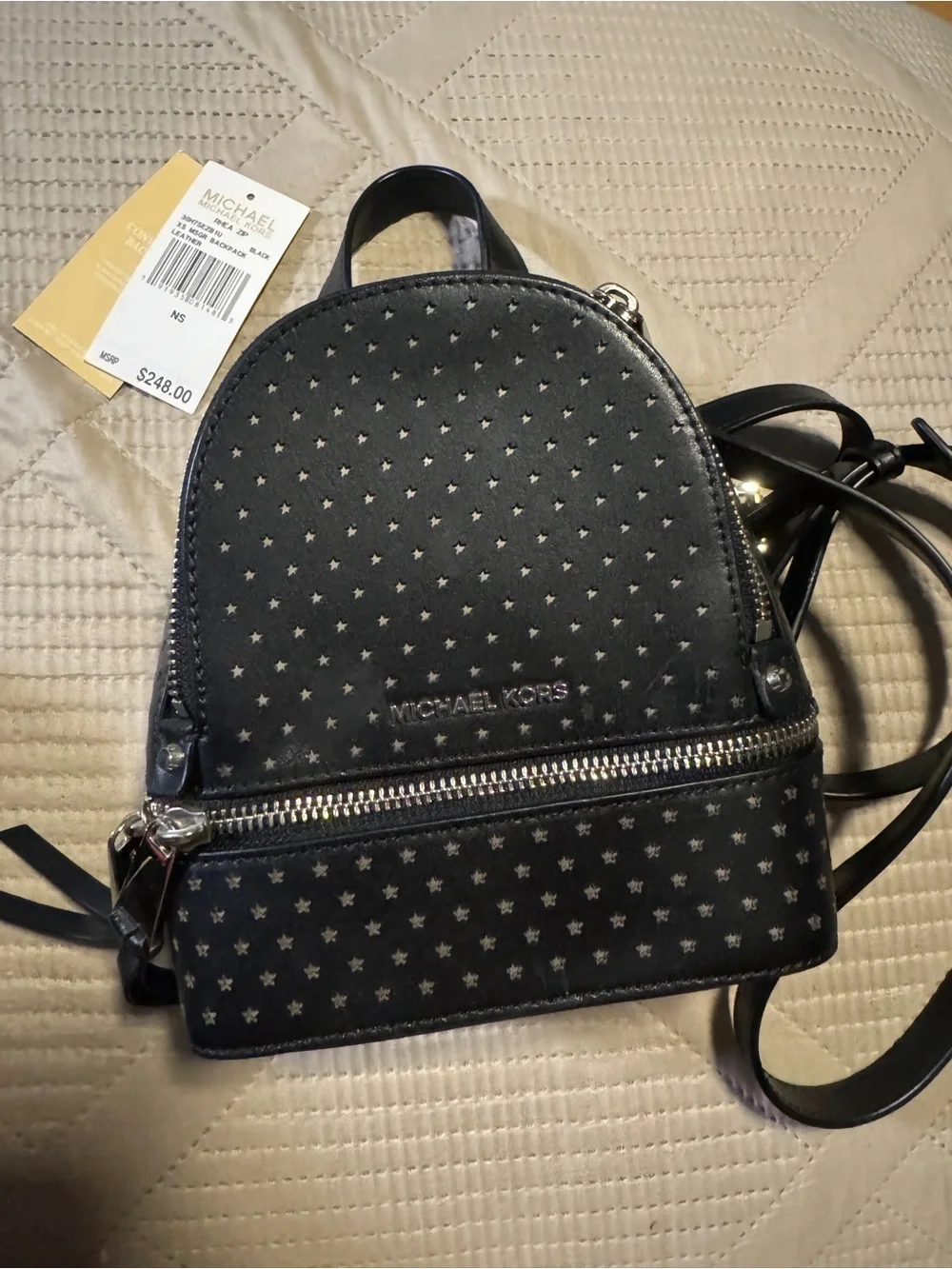 Michael Kors Rhea Mini Perforated Leather
Backpack - Picture 1 of 6